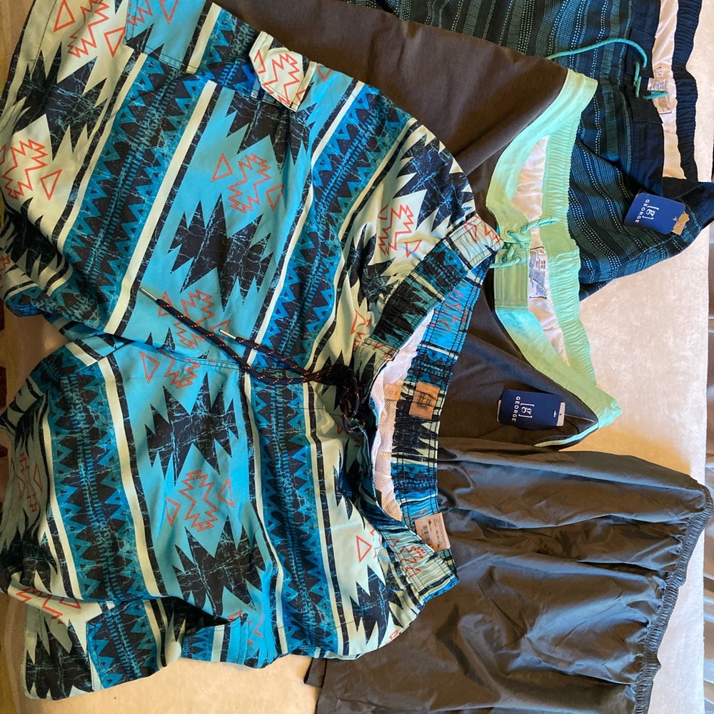 Lot #9 4 pair swimming trunks